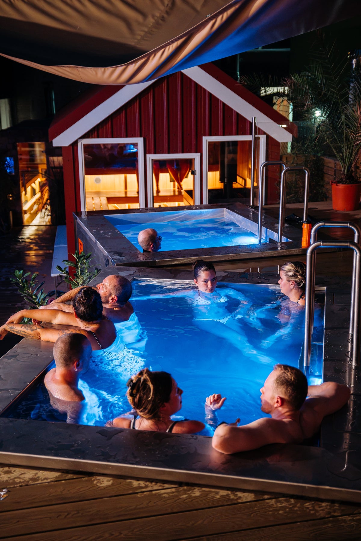 Group in the hot tub during a private sauna hire at Cardiff Sauna Village